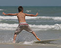 Boy Surfing